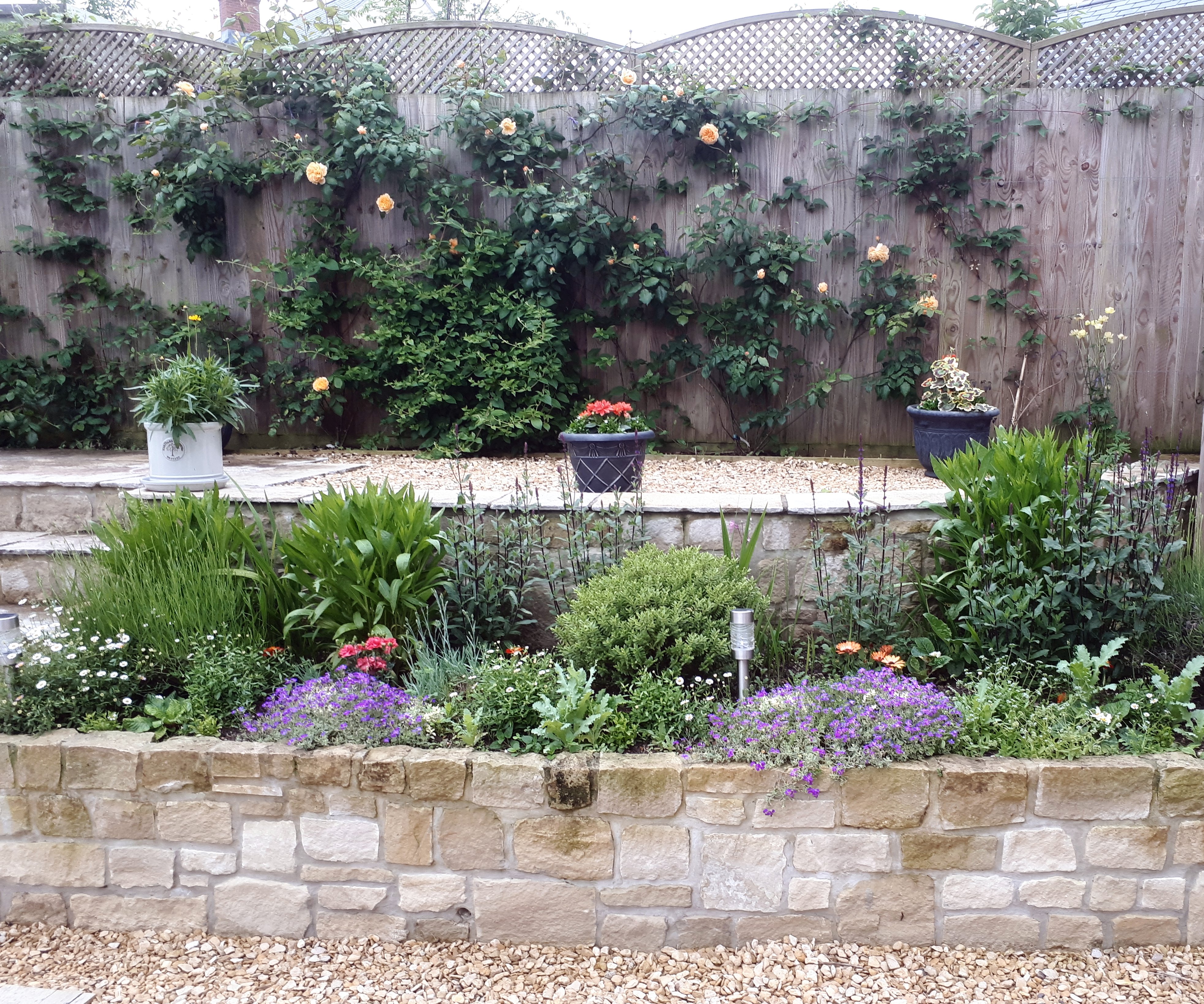 Planting schemes for a walled cottage garden in Tisbury, Wiltshire